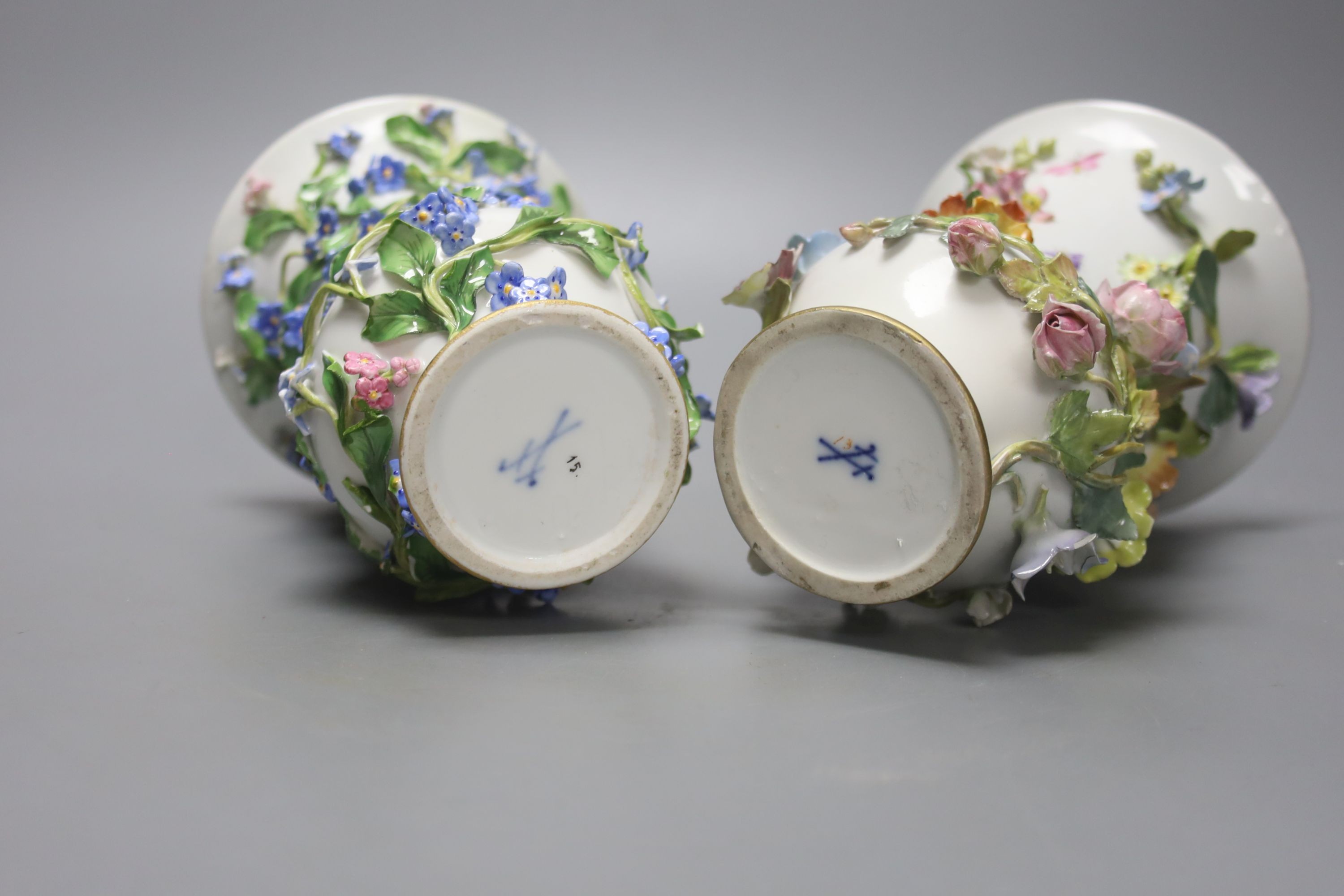 Two similar 19th century Meissen pot pourri vases and one cover, tallest 20cm